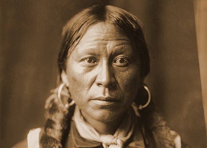 Head-and-shoulders portrait of a Jicarilla Apache man