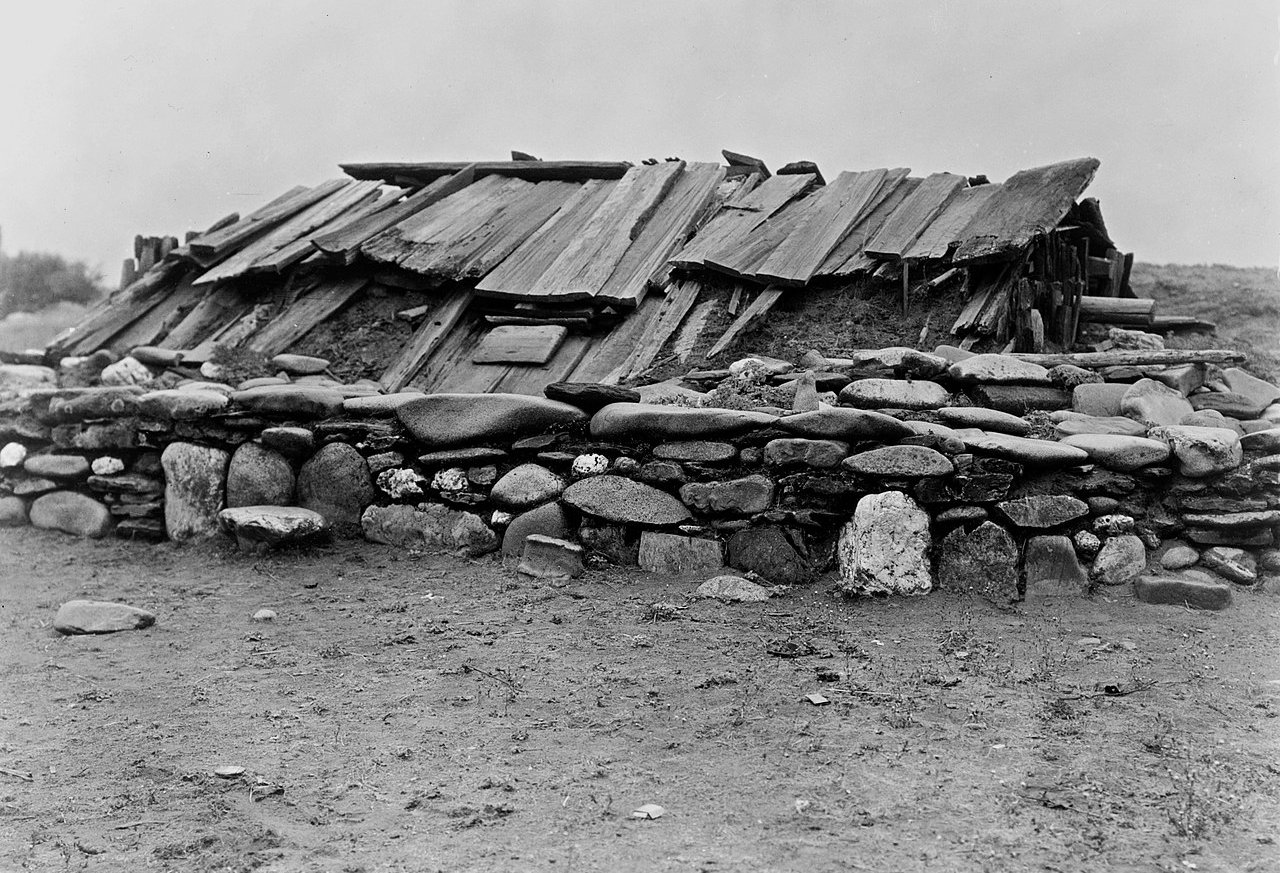 Hupa Indian underground building with wood plank roof