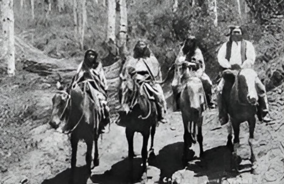 Ute Indians riding horses in 1878