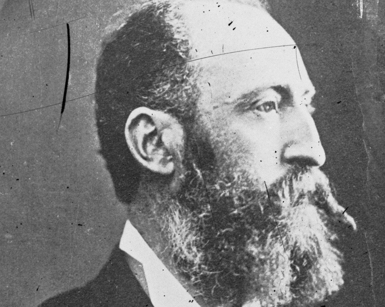 Grayscale Portrait Photo of the Australian explorer Ernest Giles