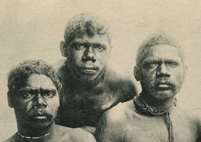 Grayscale Portrait Photo of Australian Indigenous peoples facing the camera
