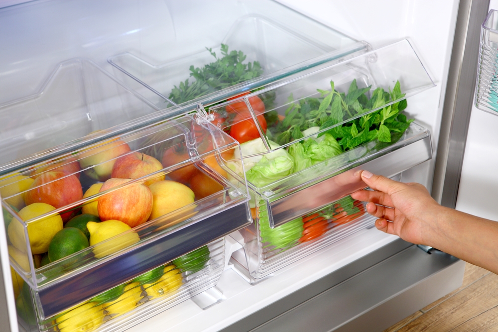 Refrigerator veggies filled with vegetables and fruits