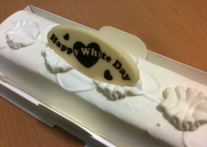 White Day Cake on a wooden table