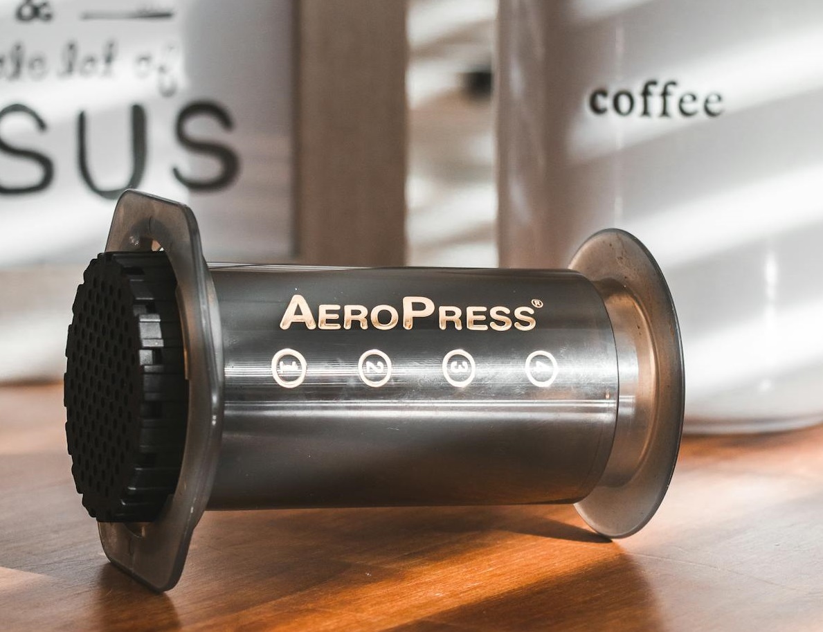 Black Coffee Press on Wooden Table