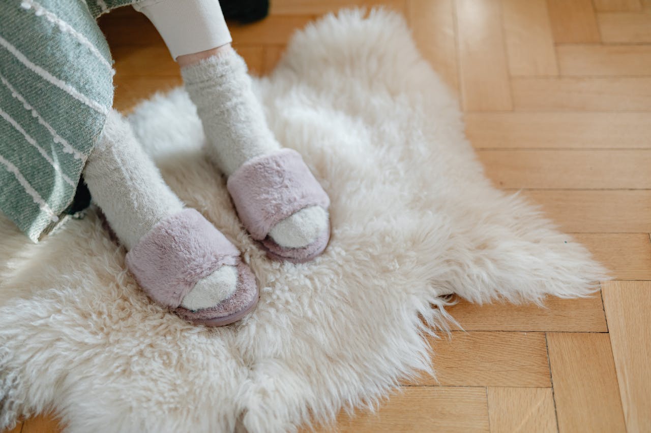 Terry Socks and Slippers on White Fur Rug