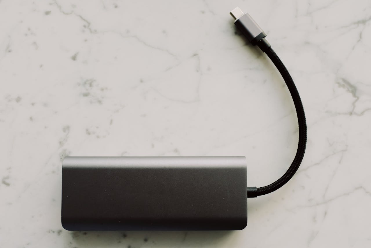 Close-Up Photo Of Power Bank with Cable