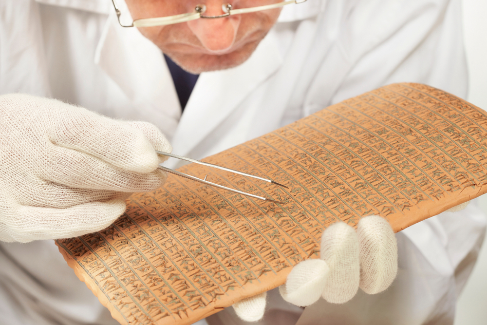 Scientist exploring ancient type of Akkad empire style cuneiform