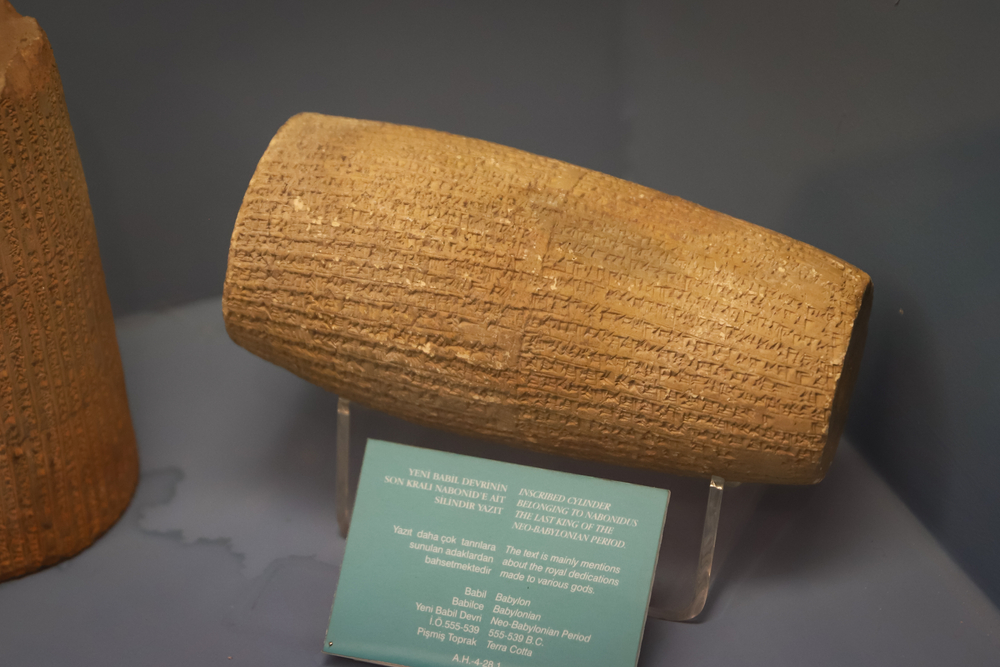 clay cylinder with old alphabet