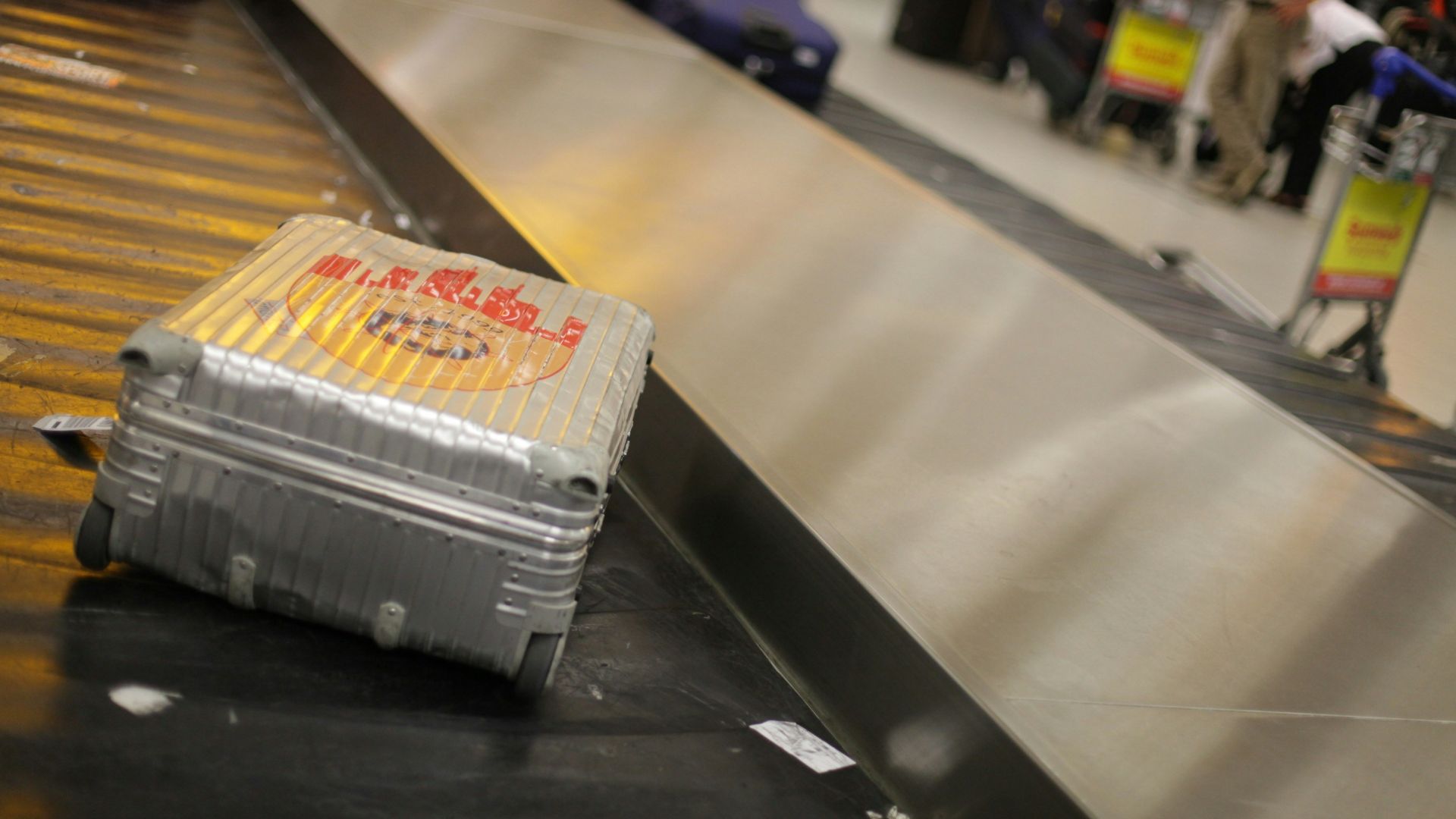 gray hardside luggage