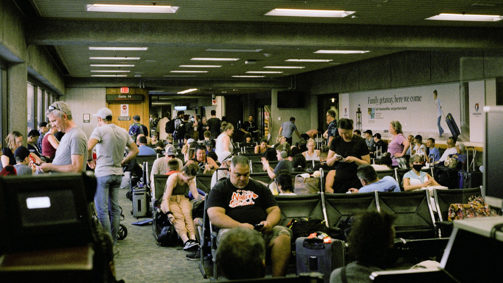 a large group of people sitting in a room