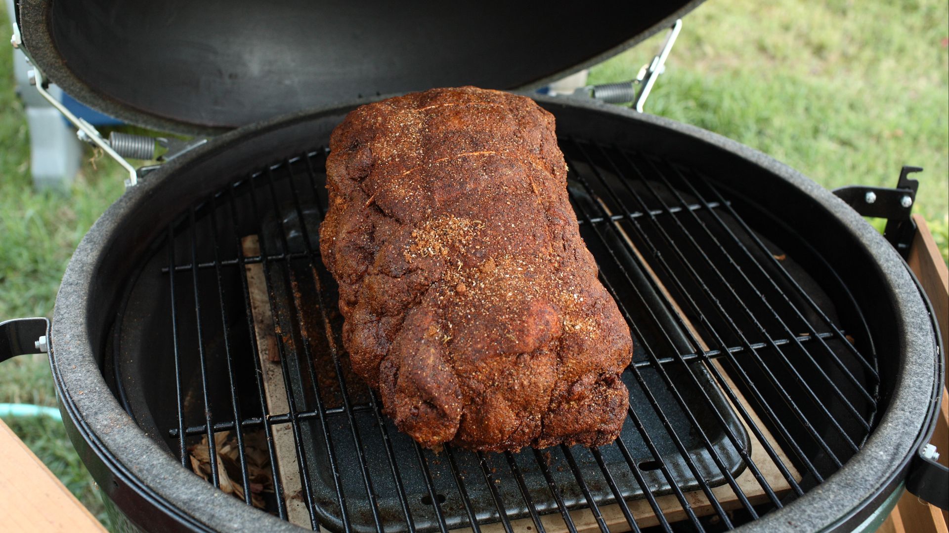 File:Pork shoulder on green egg smoker.jpg
