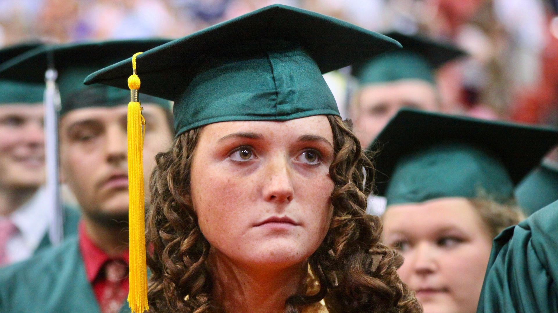 File:A high school graduate at a graduation ceremony.jpg