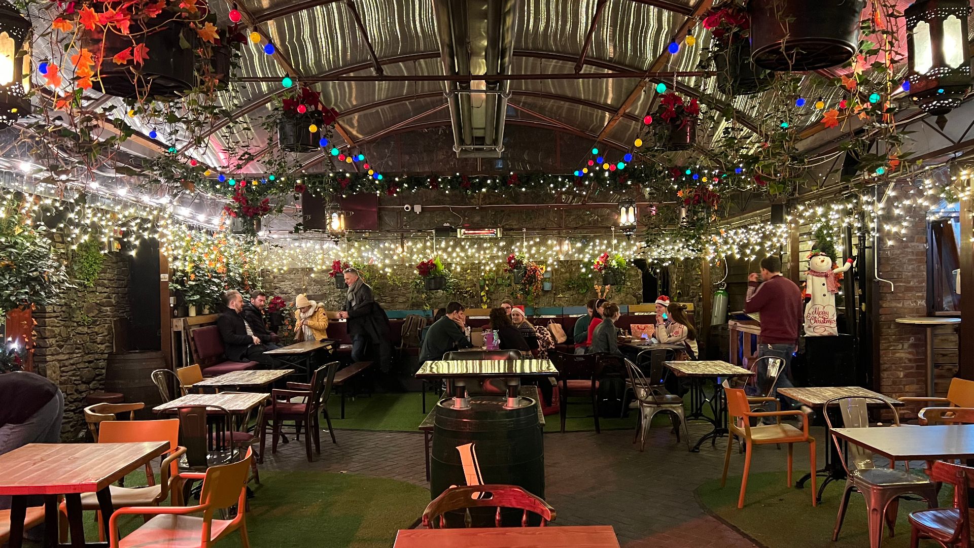 File:Beer garden in Franciscan Well with old monastery walls visible.jpg