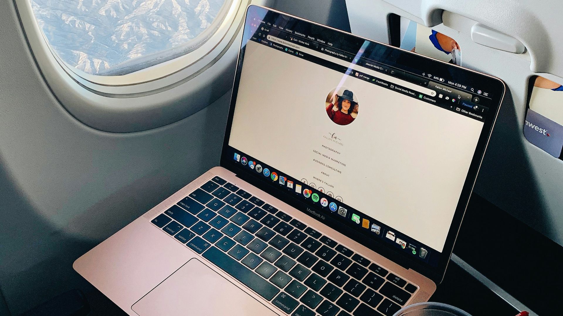 a laptop computer sitting on top of a table