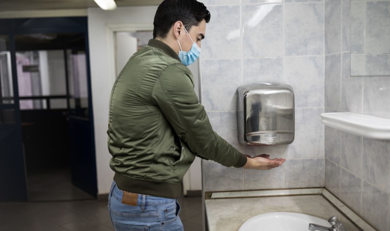 Using the Hand Dryer Like It’s a Jet Engine