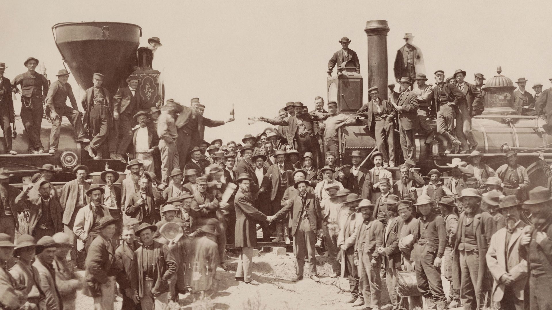 File:East and West Shaking hands at the laying of last rail Union Pacific Railroad - Restoration.jpg