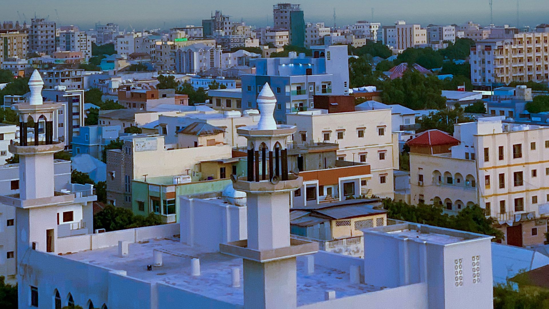 A view of a city with tall buildings