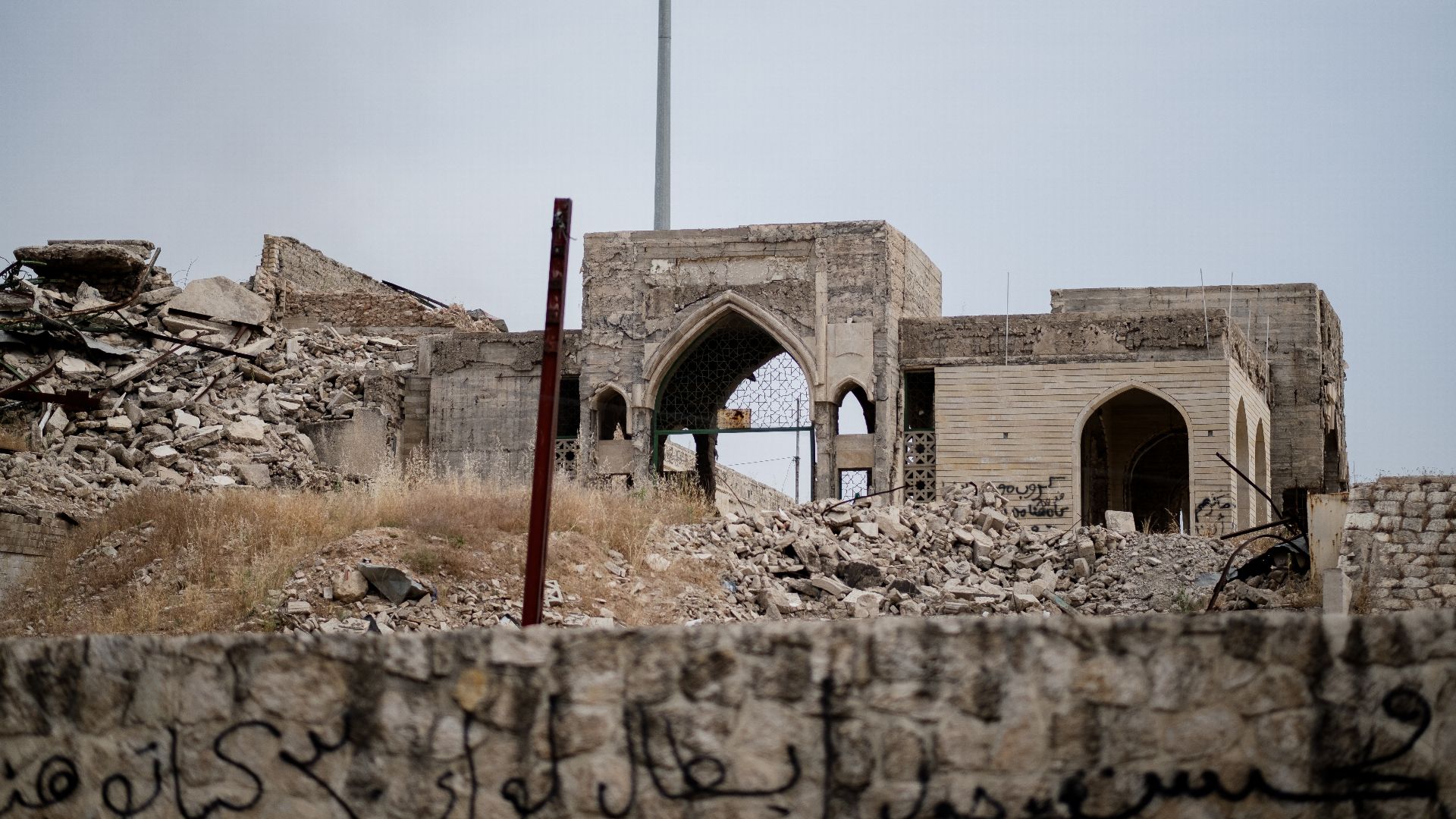 File:Views of the ruins and markets at the mound where the Shrine of Nebi Yunis was built, in summer of 2019 after its destruction by the Islamic State 19.jpg