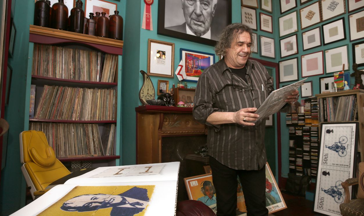 Mark McCloud runs the Institute of Illegal Images, a collection of framed acid tabs and other psychedelic art, out of his home in San Francisco, California, on Thursday, April 23, 2015.