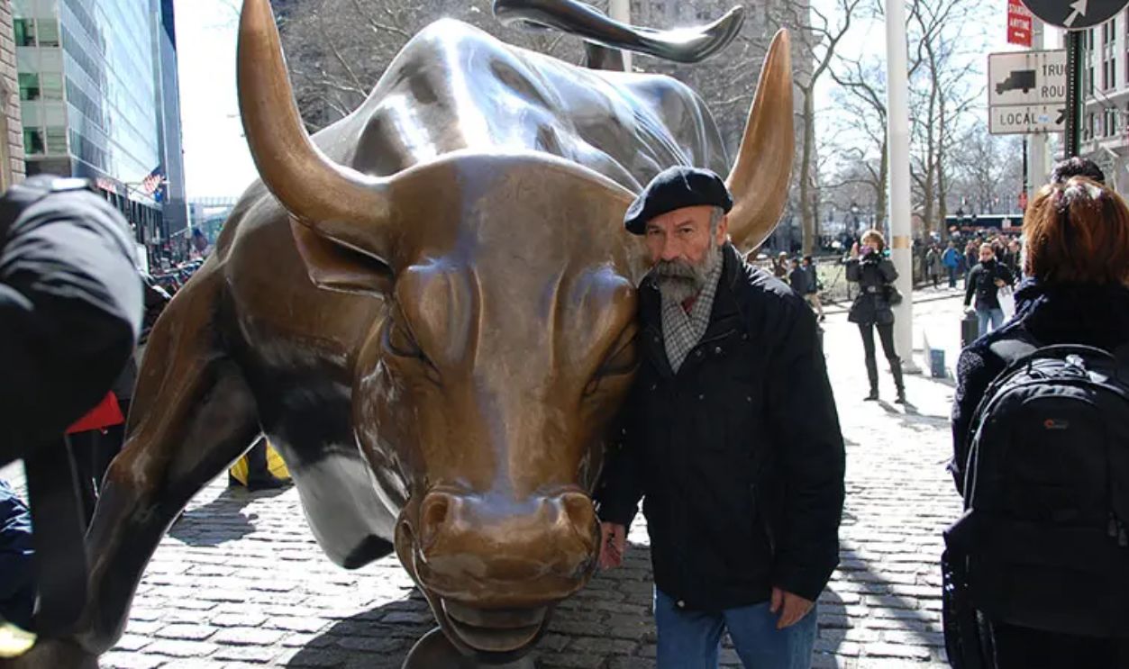 man and charging bull