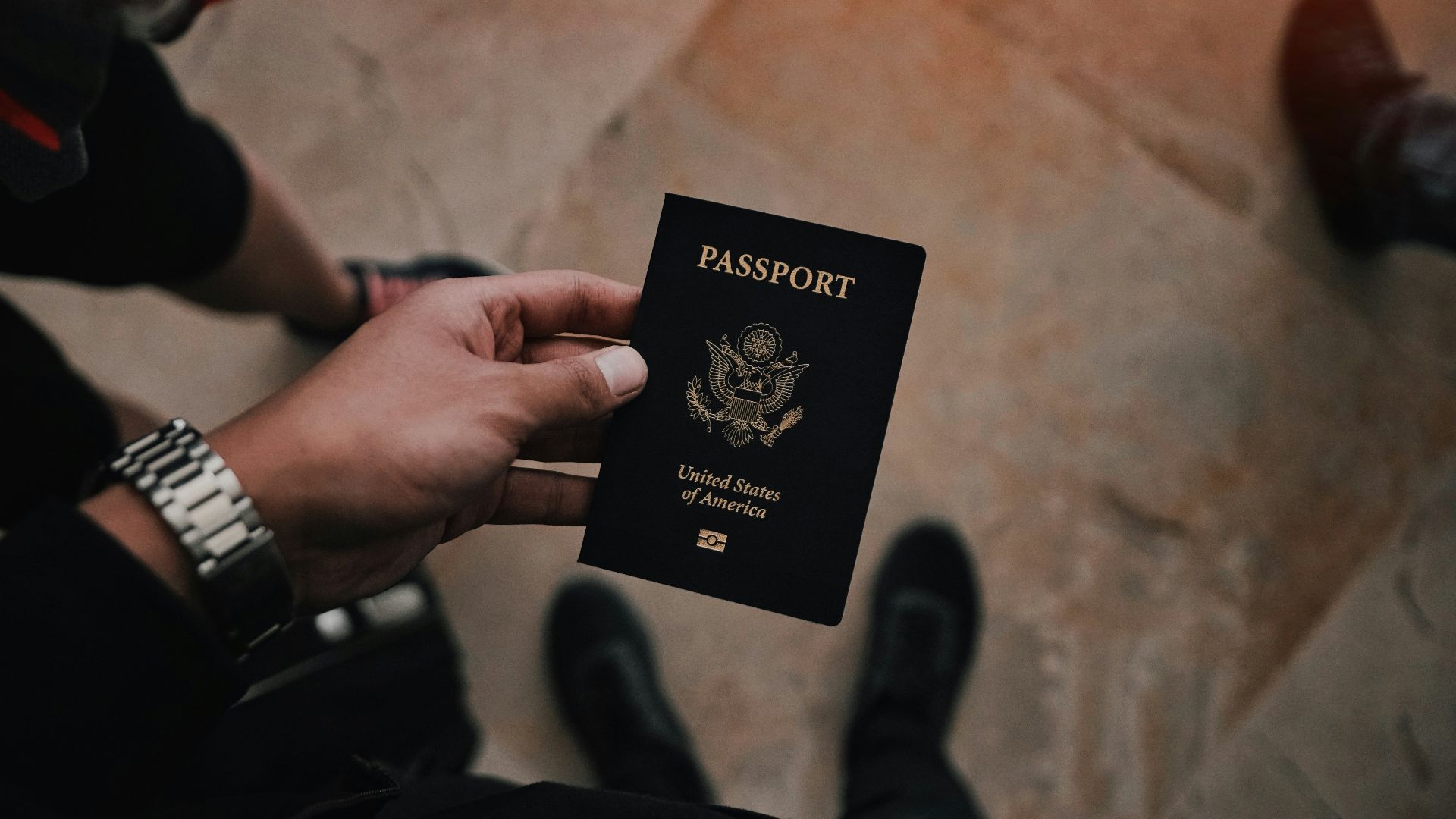 person holding passport