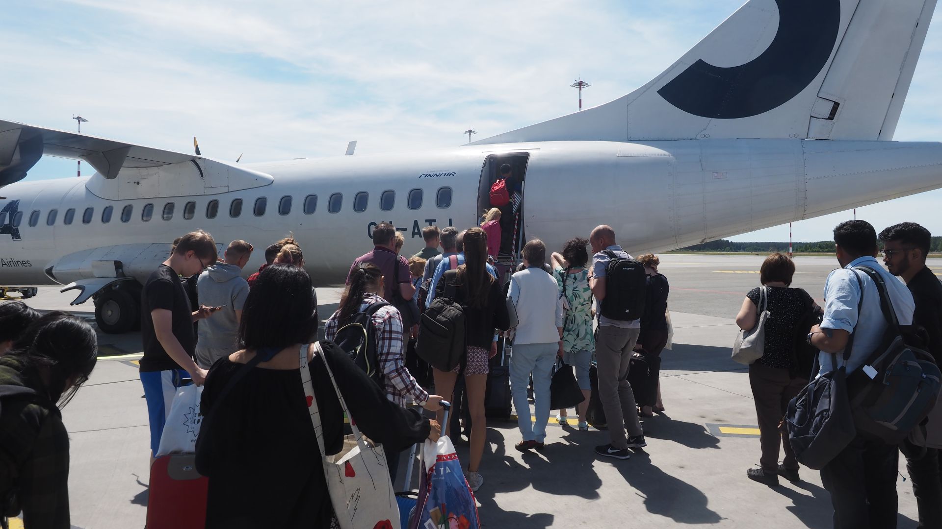 File:People boarding OH-ATI at Riga Airport.jpg