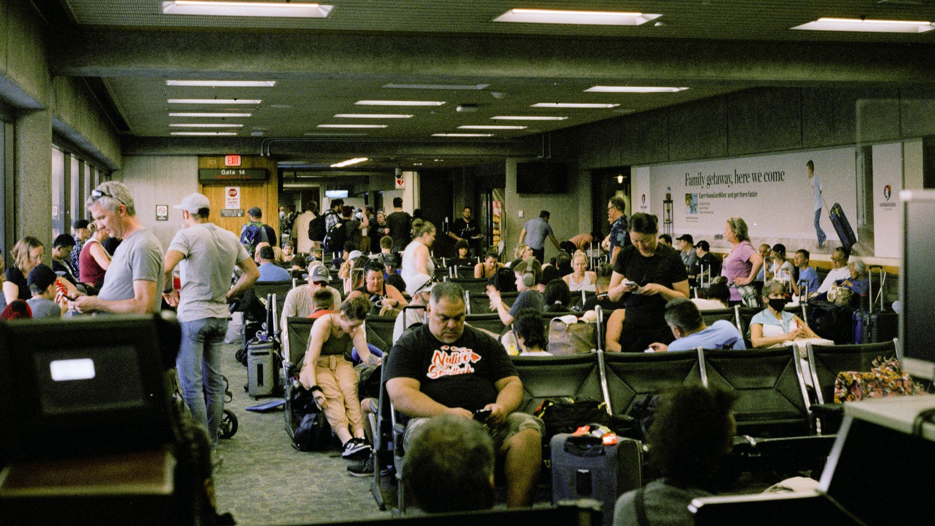 a large group of people sitting in a room