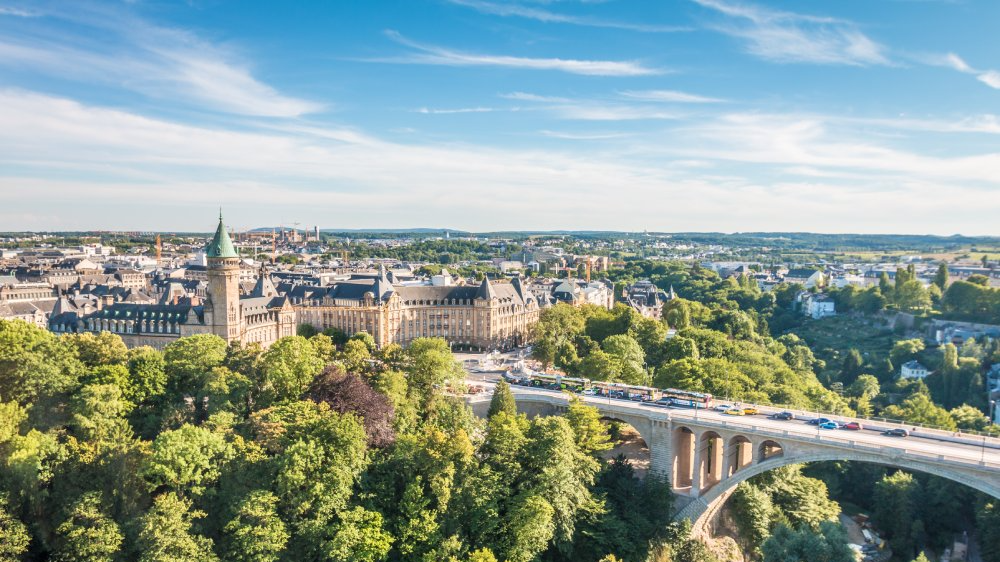 The image showcases a Vibrant urban scene of Luxembourg City, Luxembourg