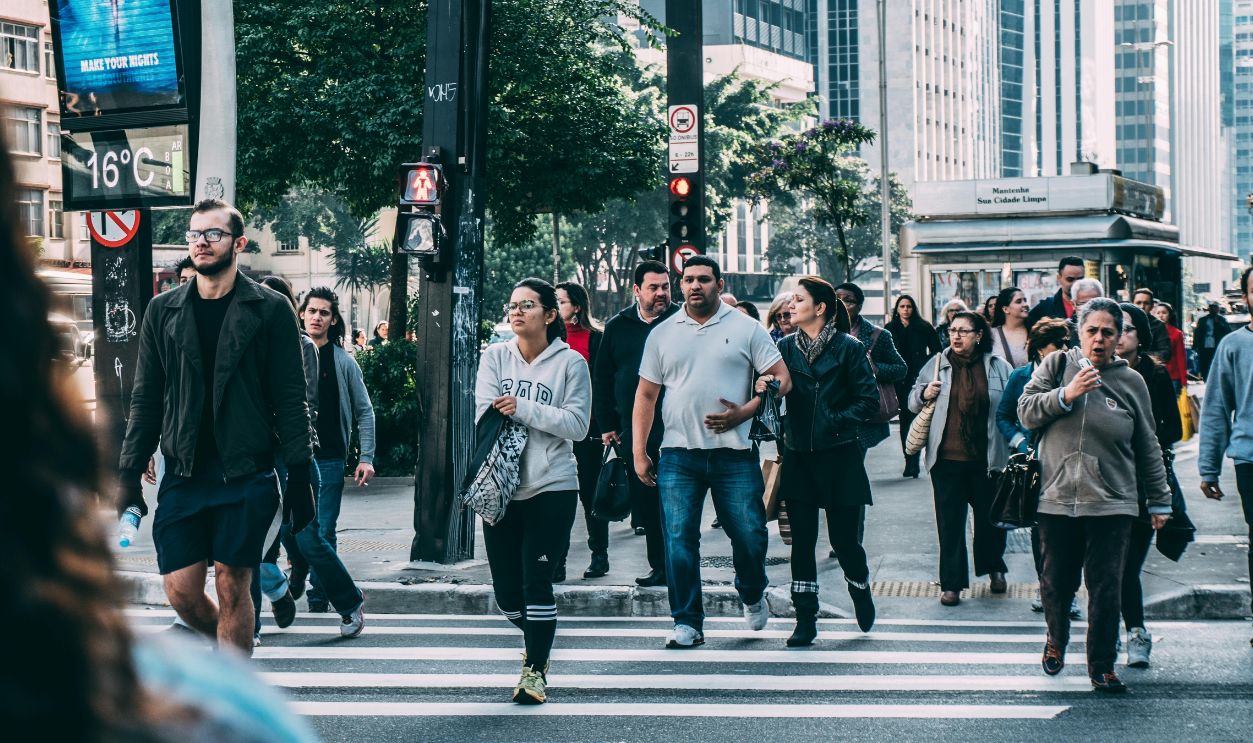 People Walking on Pedestrian Lane during Daytime