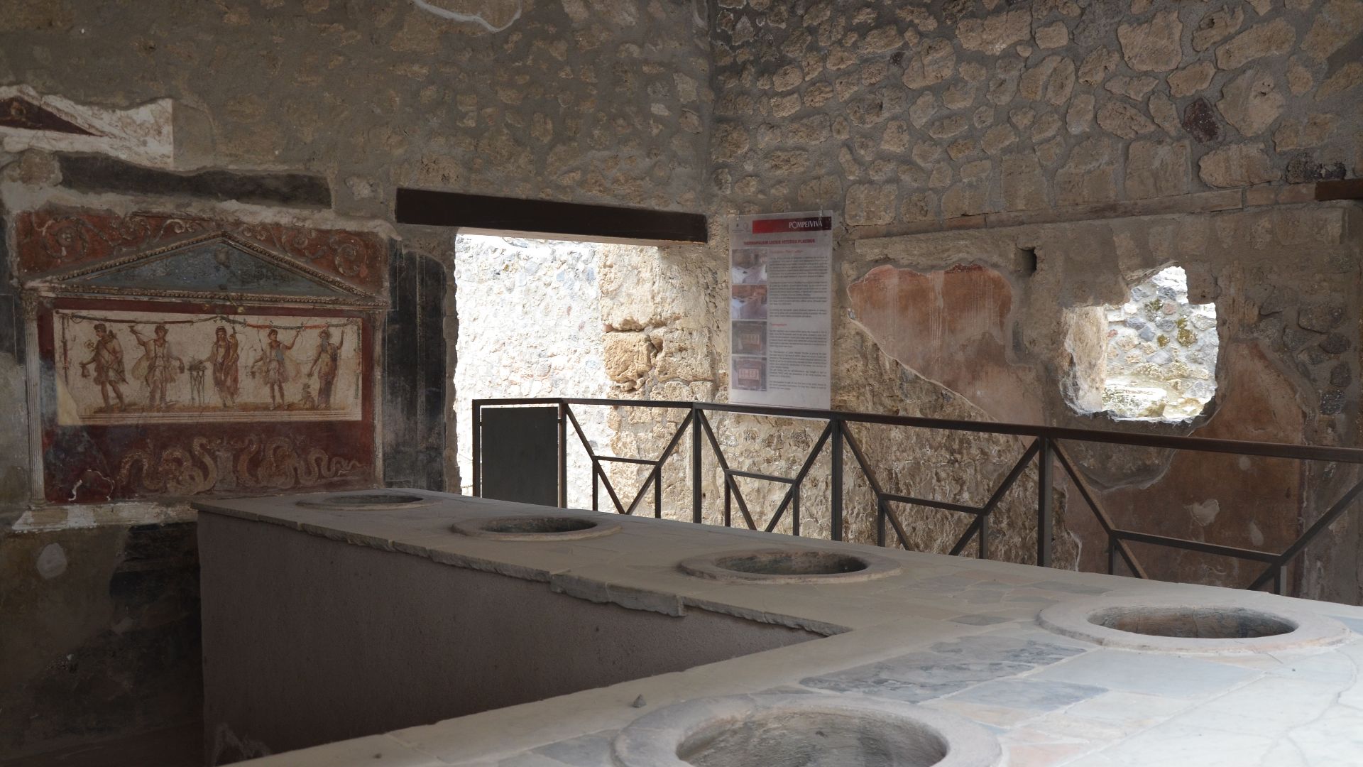 File:Thermopolium of Vetutius Placidus opening directly onto the south side of the Via dell'Abbondanza, Pompeii (15042641332).jpg