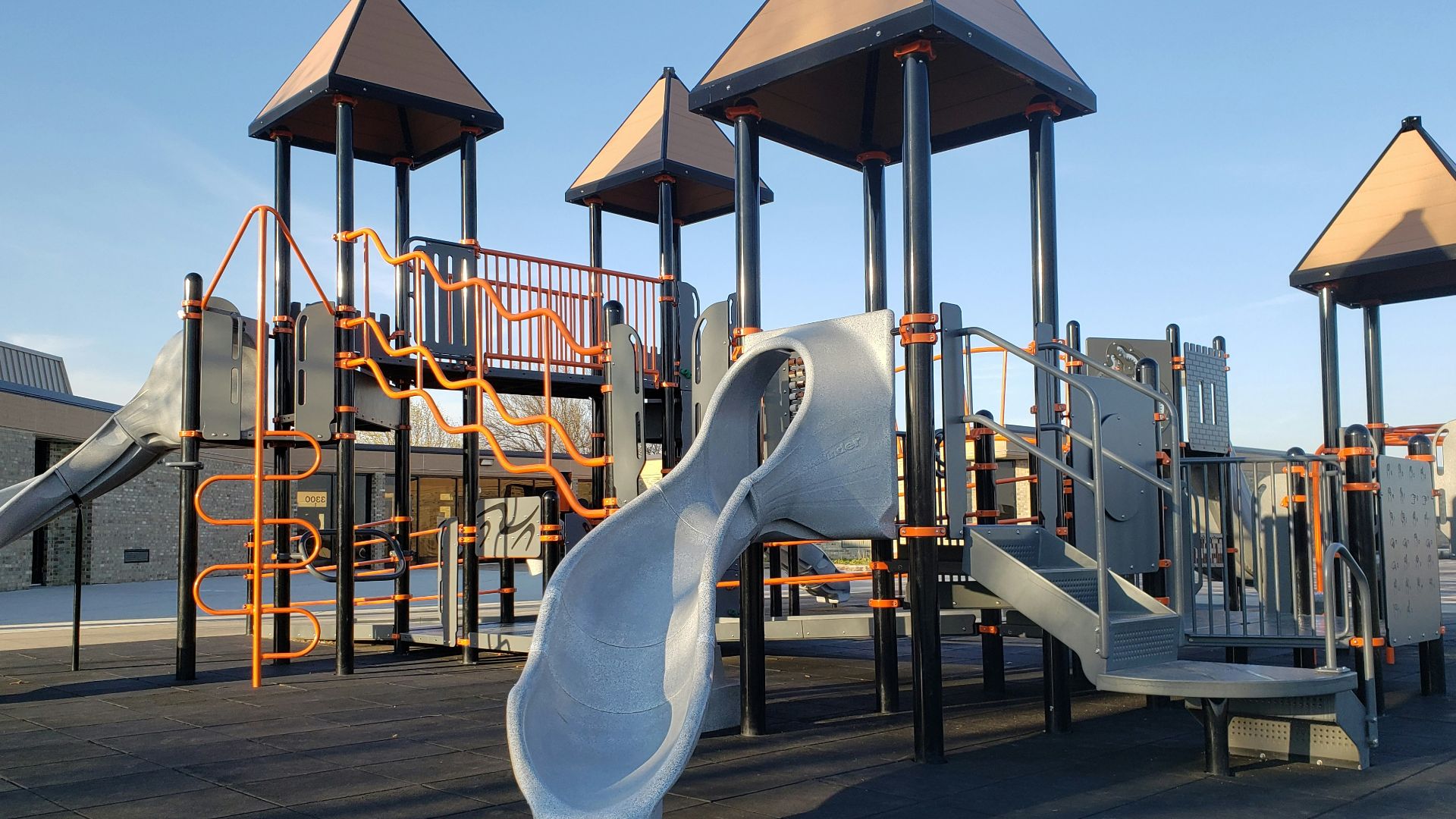 white and brown wooden bench near body of water during daytime