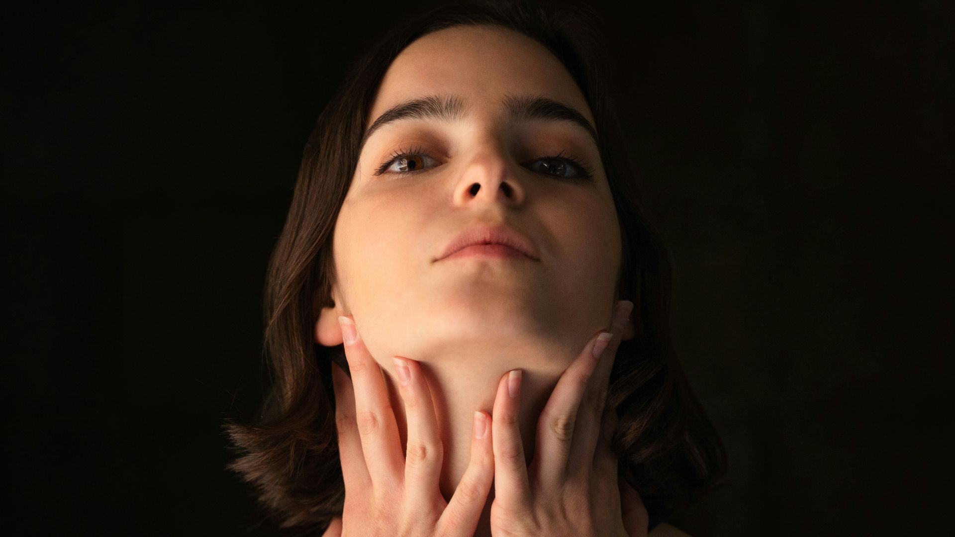 woman in black spaghetti strap top