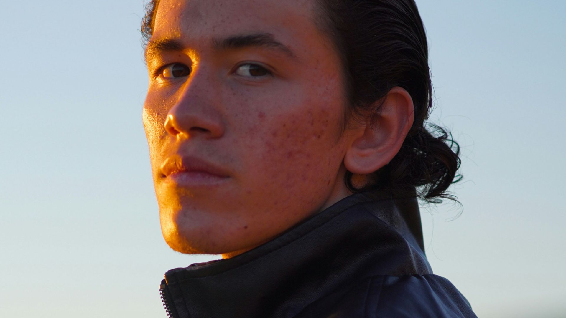 woman in black and yellow hoodie