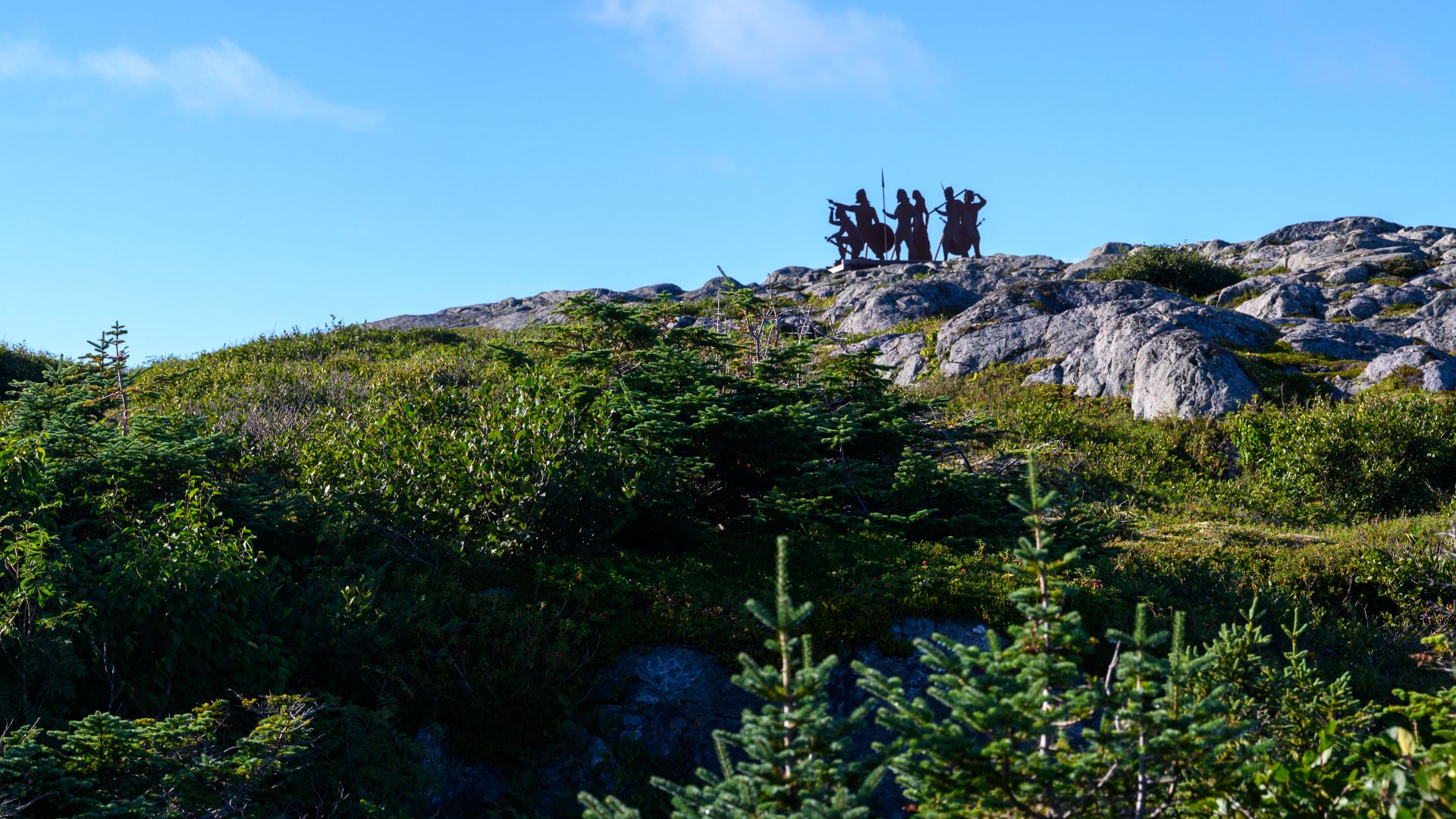 File:2022-08-27 01 Silhouette sculpture of Norsemen above L'Anse aux Meadows, NFL CAN.jpg