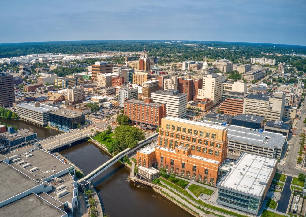 The image showcases a Vibrant urban scene of Lansing, Michigan
