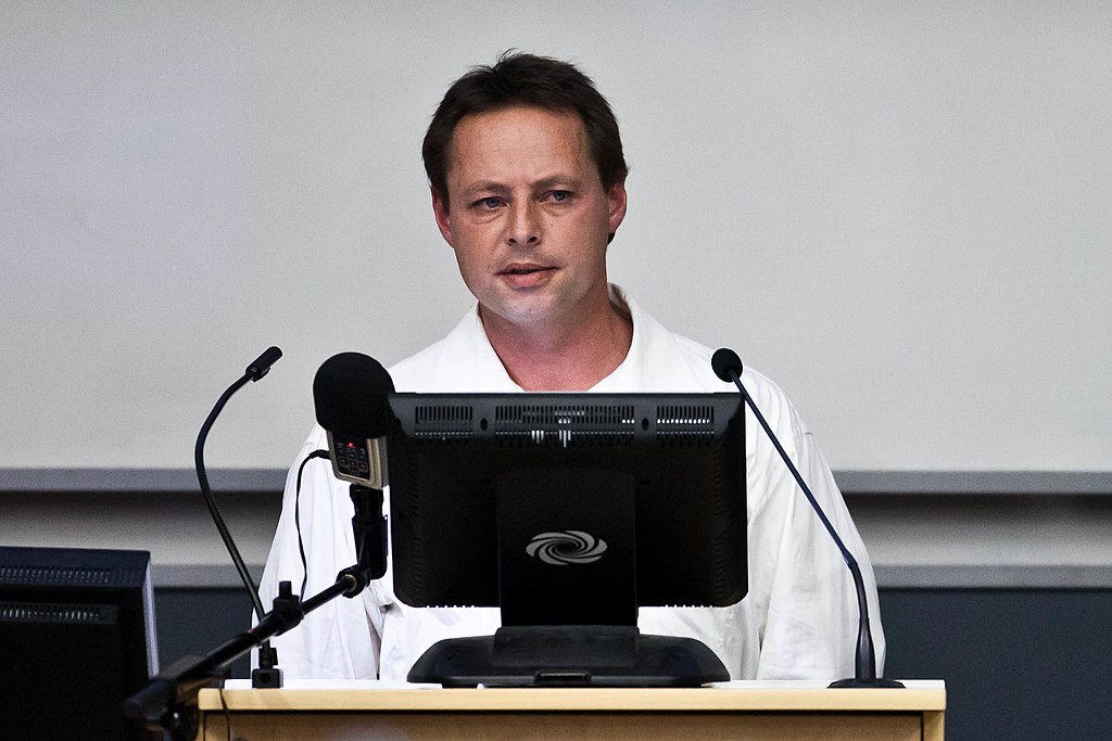 Portrait Photo of David Matthew Hicks speaking in 2012