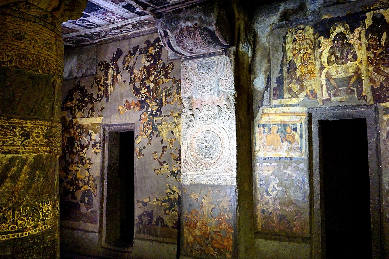 Cave 2 fresco above the right door shows Buddha in Tushita heaven