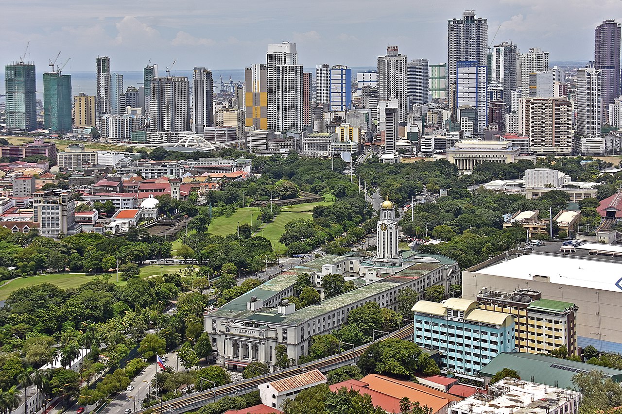 Aerial view showing Manila City Hall with a view of the Binondo Skyline