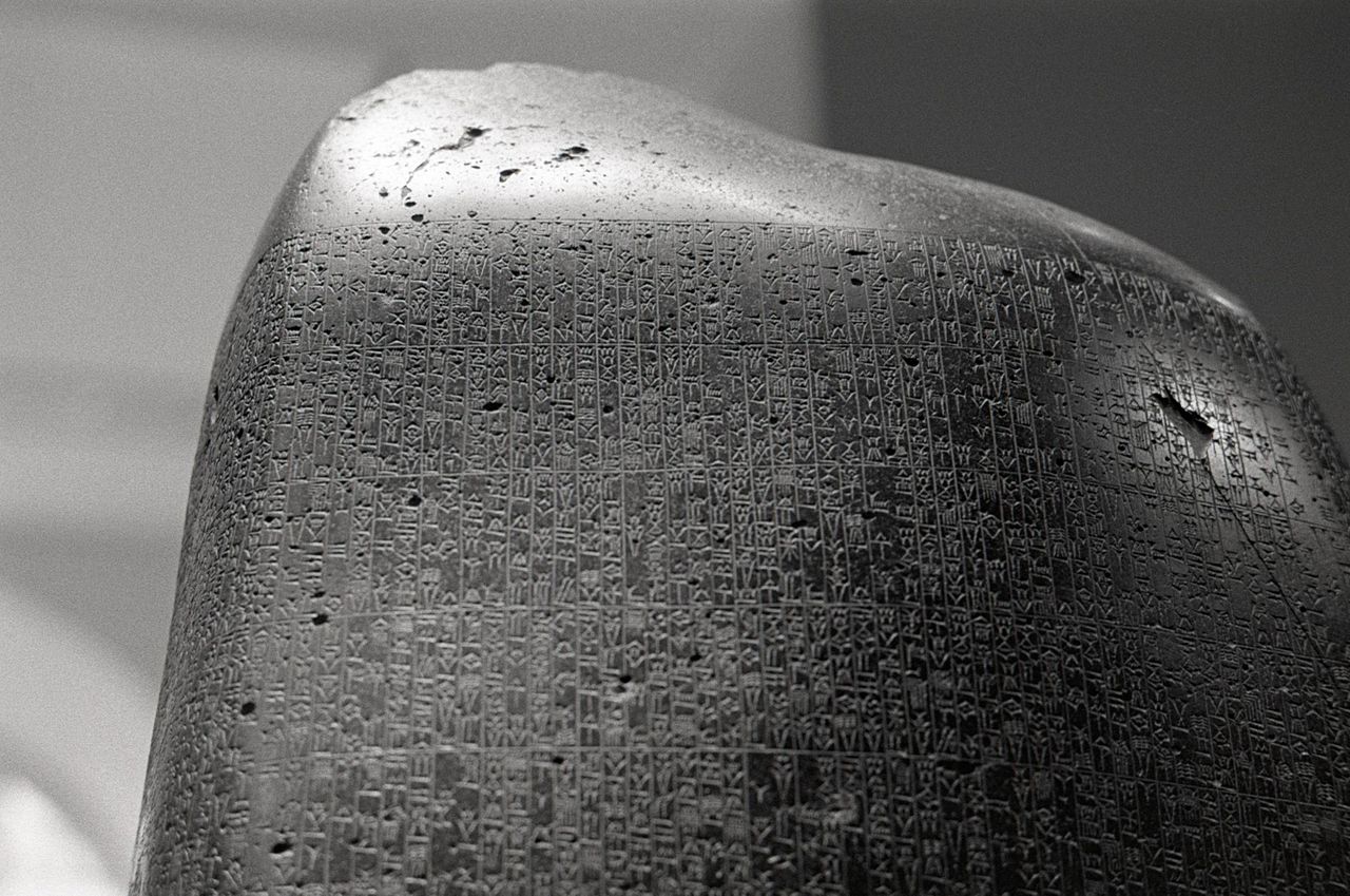 Close up photo of the Code Of Hammurabi in Louvre Museum