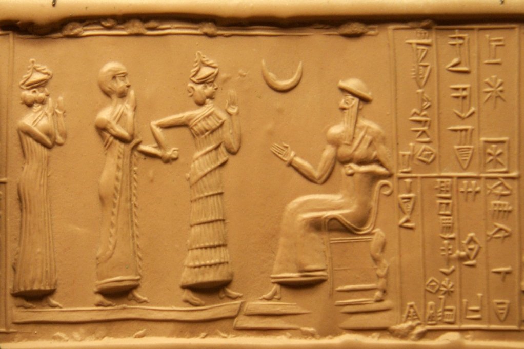 The Sumerian King Ur-Nammu (seated), the creator of the Code of Ur-Nammu