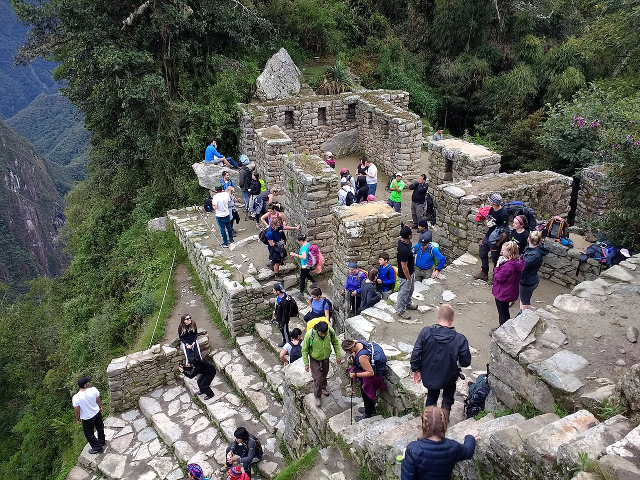 Tourists at Inti Punku (Sun Gate) at Machu Picchu