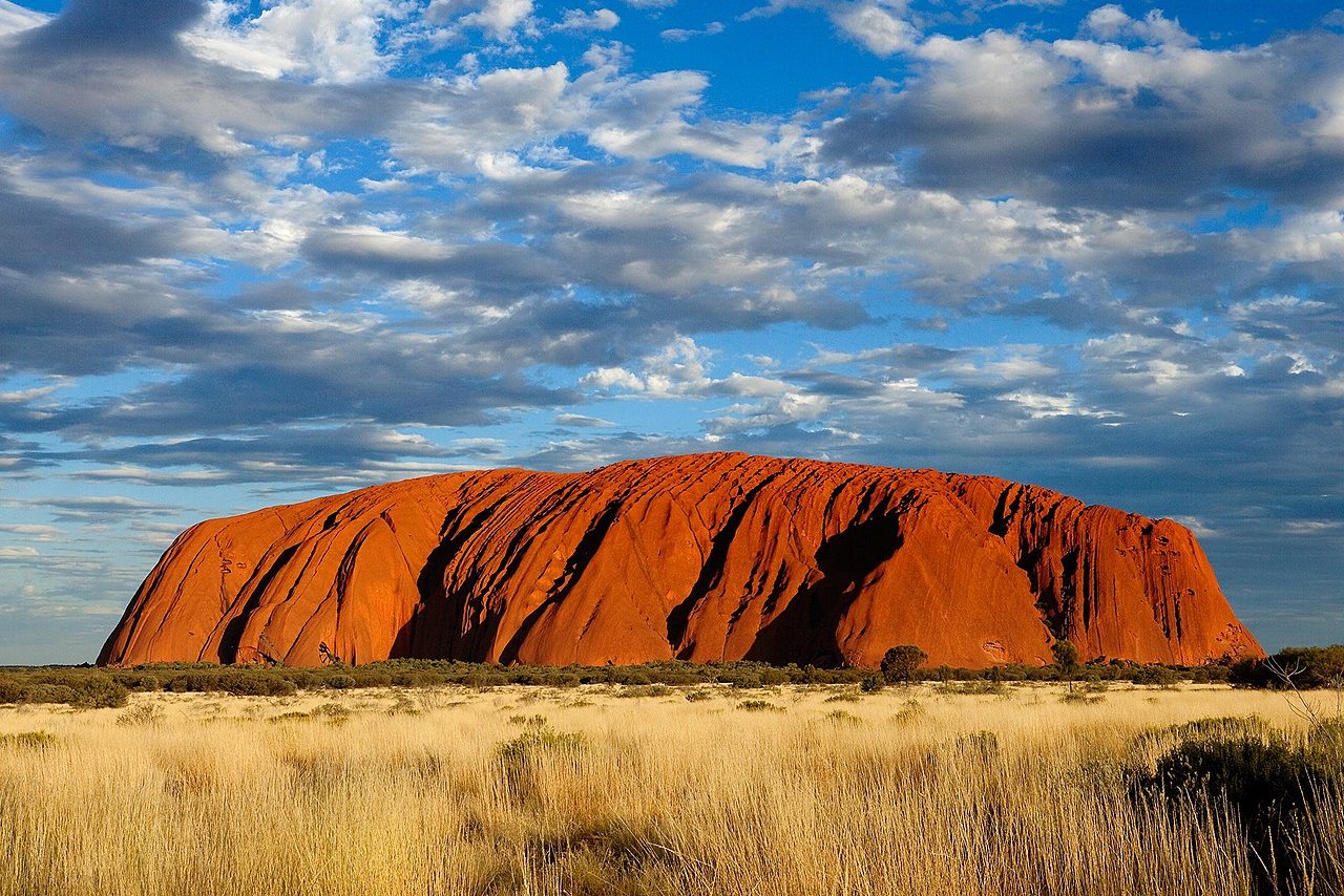 Uluru, a massive sandstone monolith in the Australian Outback