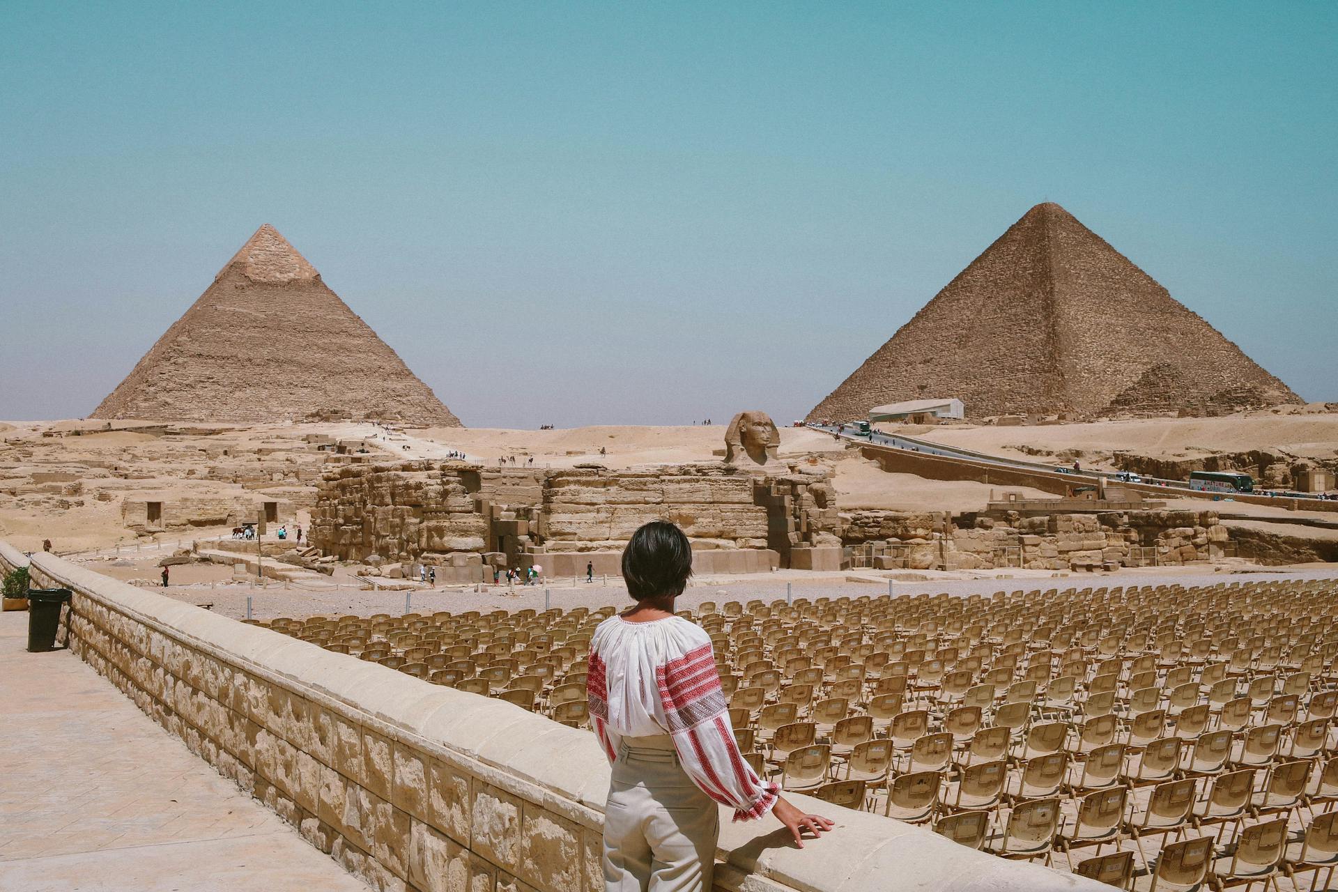 Woman Looking At Pyramids