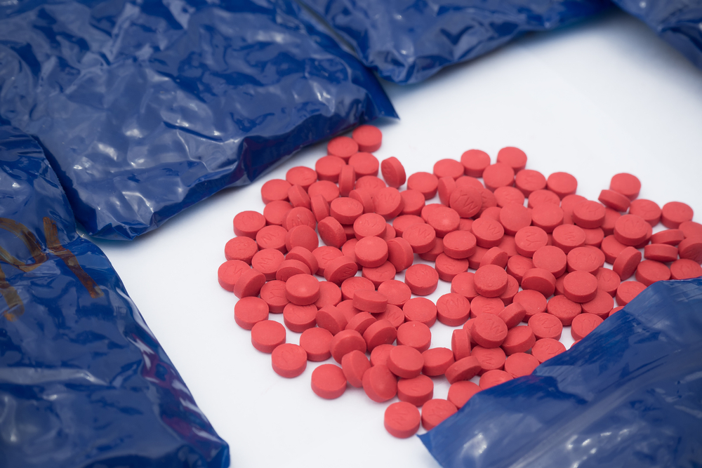 Pills in plastic bags.