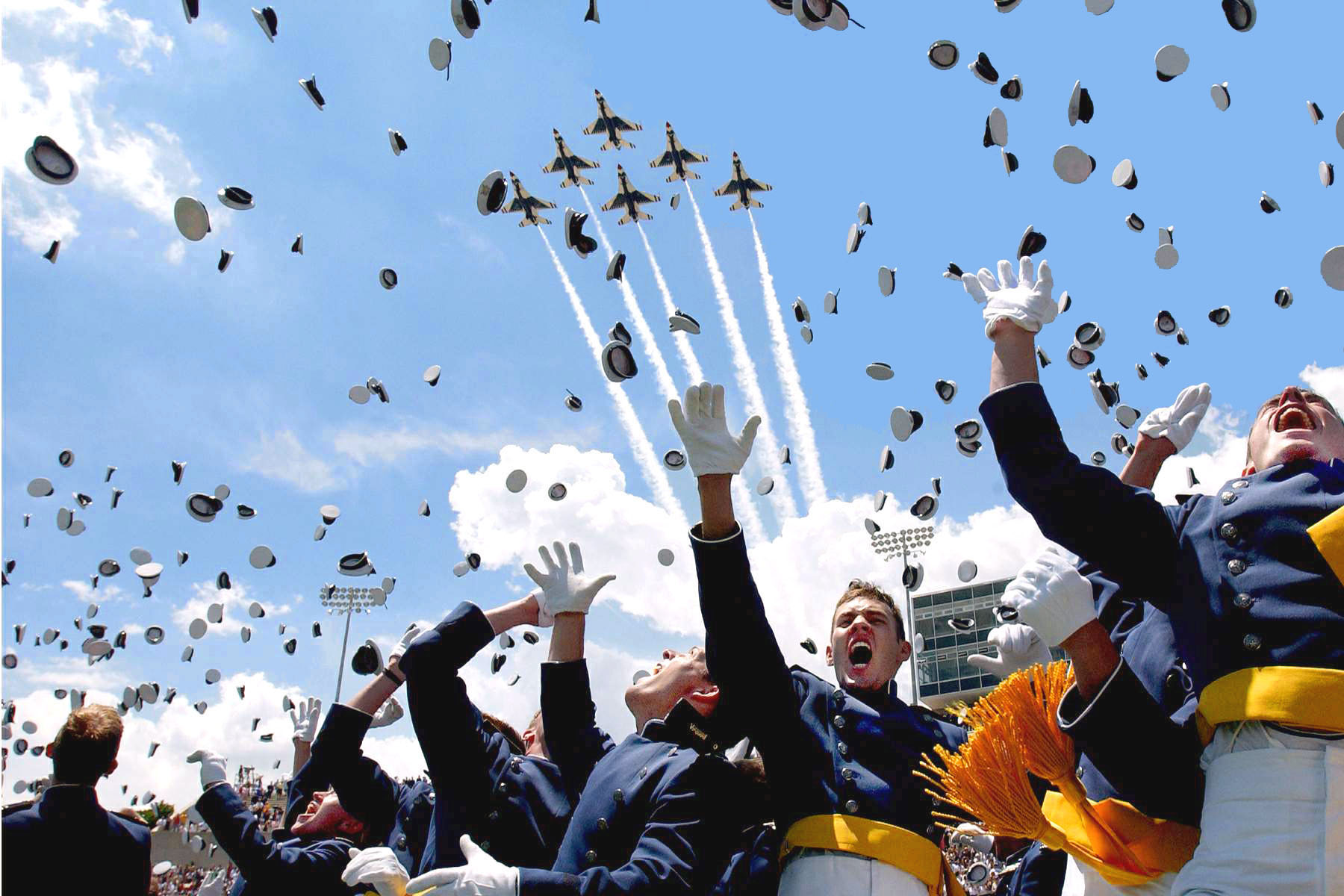 Air Force Academy cadets celebrate after graduation