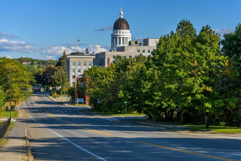 The image showcases a Vibrant urban scene of Augusta, Maine captured from a high vantage point
