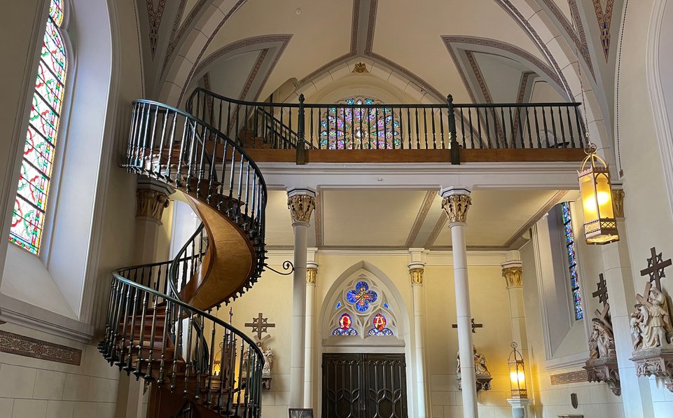 Interior view of the famous Loretto Chapel and the spiral staircase