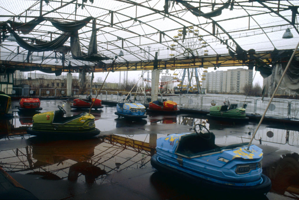 Bumper cars at a once popular amusement park stand abandoned in Pripyat, three kilometers away from the Chernobyl nuclear plant.