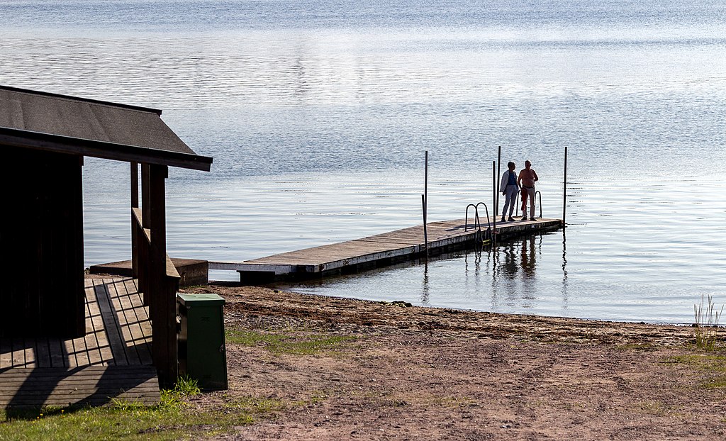 A Couple On A Jetty At Röhälla Beach, Govik - Sweden - 2021