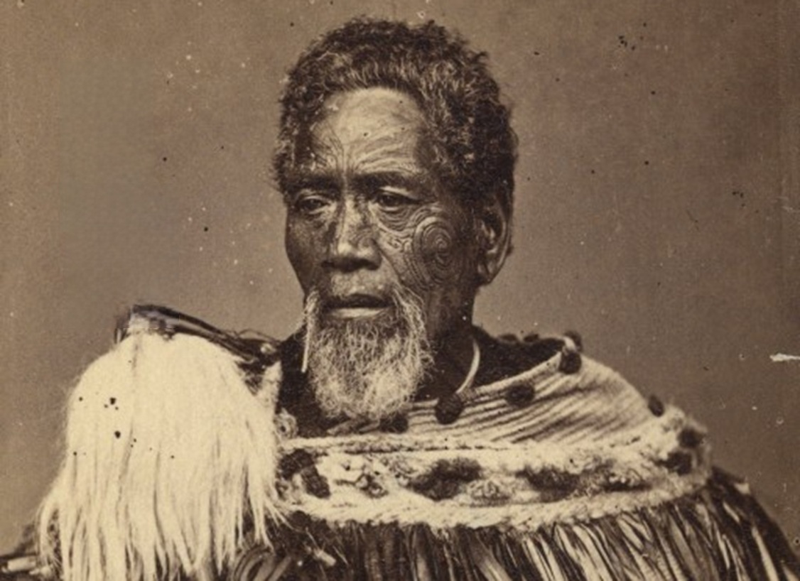 Maori chef holding a taiaha - between 1860 and 1879
